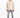 A man stands confidently in a light beige button-up top, paired with distressed gray jeans and white sneakers.