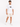 A man wearing a white graphic t-shirt and light beige distressed shorts, standing against a plain background.