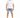 A man stands confidently in a casual outfit featuring light blue denim shorts and a plain white t-shirt.