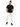 A man stands confidently in a black t-shirt and cream cargo pants, paired with stylish black sneakers.