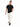 A man stands confidently in a black t-shirt and cream cargo pants, paired with black sneakers.