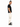 A man stands sideways wearing a black t-shirt and cream cargo pants with multiple pockets and black sneakers.