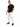 A man stands confidently in a black t-shirt and cream cargo pants, paired with stylish black sneakers.