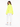 A woman with long hair wears a bright yellow oversized top and white joggers, standing with her back to the camera.