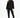 A woman stands confidently in a black, oversized sweatshirt paired with matching joggers and white sneakers.