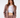 A model poses in a fitted, light brown blazer and matching trousers over a white crop top, showcasing a stylish look.
