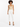 A model wearing a beige sleeveless bodysuit paired with white tailored pants and black strappy heels.