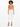 Model wearing a fitted, tan bodysuit paired with white tailored pants and black strappy heels.