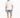 A man wearing a loose white t-shirt and distressed denim shorts, paired with white sneakers.