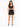 A model showcases a black cropped top with lace-up details and a matching skirt featuring side ties.