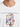 White t-shirt featuring colorful, playful text and motivational phrases in a bold, graphic design.