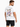 A man wearing a white t-shirt with colorful text and graphic designs on the back, paired with dark shorts.