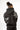 A person with a bun hairstyle wears a black hoodie featuring intricate silver coral designs on the back.