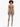 A model showcases a colorful two-piece set featuring a cropped top and fitted leggings with vibrant patterns.