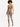 Two-piece set featuring a cropped top and leggings with vibrant, abstract patterns in various colors.