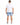 A man is shown from the back wearing a fitted white short-sleeve shirt and light blue denim shorts.