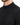 Close-up of a black t-shirt featuring a high collar and smooth fabric texture, highlighting its modern design.