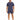 A man stands wearing navy shorts and a matching t-shirt, paired with white sneakers.