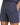 Navy blue shorts with an elastic waistband, drawstring, and side pockets, featuring a subtle logo detail.