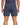 A person wearing navy blue shorts with a back pocket, showcasing a casual and comfortable style.