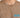 Close-up of a brown t-shirt featuring a textured finish, with a blue graphic and a quote symbol on the chest.