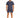 A man stands confidently in a navy blue short-sleeve top paired with matching shorts and white sneakers.