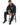 No Risk Pants Set in Black – seated front view with white slogan prints on hoodie and leg