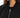 Ellis Bomber Jacket in Black – close-up of the ribbed collar and gold-tone front zip