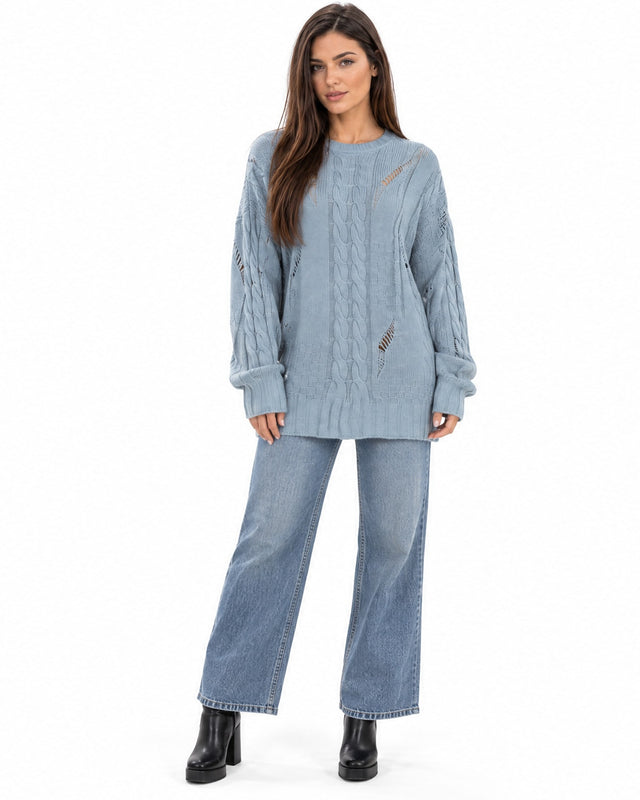 Saylor Sweater in Light Blue – full-length front view of distressed cable knit, worn with wide-leg jeans
