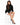 Celine Sweater in Black – seated model in turtleneck with frayed hem, worn with white shorts