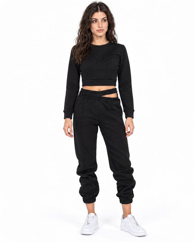 Eyes Pants Set in Black – full-length front view of bustier-seam crop top and cutout-waist joggers