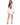 Nina Skirt Set in White – full-length front view of cropped one-button blazer and asymmetric wrap mini skirt