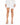 Nina Skirt Set in White – front view of the asymmetric wrap-panel mini skirt worn with matching jacket