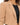 Ride Blazer in Camel – close-up of the notched lapel, curved seams and gold bar button over a black top