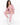 Remi Bodysuit Set in Pink – seated model in scoop-neck bodysuit, zip hoodie and drawstring joggers