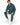 Gordon Hoodie Set in Teal – model seated on a stool, ribbed hoodie and cuffed joggers