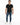 Finn Jeans in Blue Wash – full-length front view with fading, worn with a black text-print T-shirt