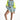 Alexia light blue and neon yellow cropped windbreaker top with matching high-waisted shorts and white platform sneakers.