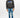 Man wearing Carbon Jeans black heritage streetwear hoodie with blue embroidery and slim-fit blue jeans.
