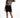 Model wears the Elora long-sleeve nude and black baroque print bodysuit with a crew neckline and body-contouring fit.