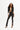 Model in Carbon black front slit high-waisted leggings and cropped blazer. Trendy split-hem streetwear style.
