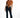 Model in Aleena bronze front knot t-shirt, a short-sleeve crop top styled with dark-wash flare jeans.
