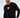 Model in Keep On Moving black long-sleeve graphic streetwear shirt with yellow urban design and Carbon Jeans logo.