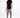 Model wearing a black mock-neck Damian shirt by Carbon Jeans paired with tan cargo pants and black and white sneakers.