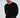 Model in black Show Must Go On long-sleeve graphic tee by Carbon Jeans with white text and vertical seam detail.