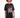 Model in Feel and Heel oversized black graphic tee with red 'Feelings In Flames' heart design and distressed jeans.