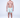 Front view of Landon patterned men's swim trunks with blue and green palm tree print on a model with white slides.