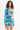 Martha green mini dress with one-shoulder sleeve, side cutout, and ruched skirt in blue-green abstract print.