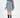 Model wearing the Saylor Sweater, a light blue oversized distressed cable knit pullover on a white background.