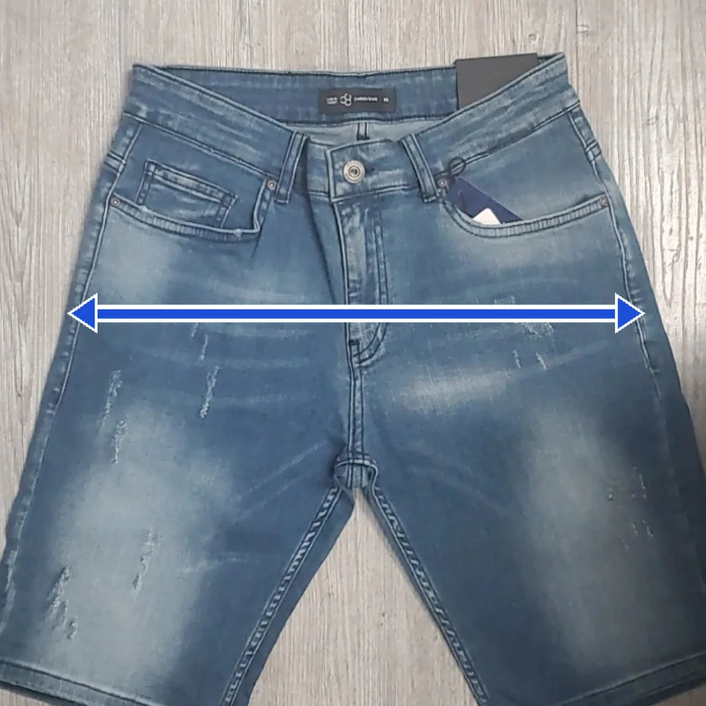 John Denim Shorts laid flat, an arrow straight across the hips